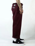 Blockade Industries Maroon Work Pants side view on model