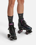 Impala Black Holographic Rollerskates on legs